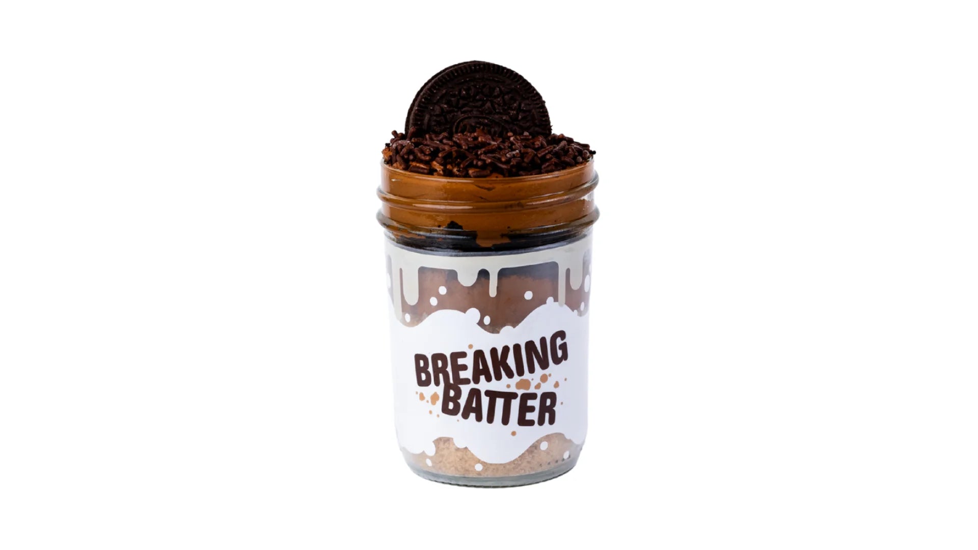 A Breaking Batter Cake Jar with Chocolate Cake, Chocolate Frosting, Chocolate Sprinkles and Chocolate Crunch in a Mini Mason Jar 