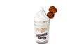 A Breaking Batter Ice Cream Cake Jar with Vanilla Tres Leches Cake, Tres Leches Frosting, Dulce De Leches Sauce, a Dusting of Cinnamon, Earl Grey Ice Cream and Churro Donut Holes.