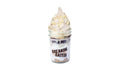 A Breaking Batter Ice Cream Cake Jar with Red Velvet Cake, Cream Cheese Frosting, White Chocolate Curls and Earl Grey Ice Cream.