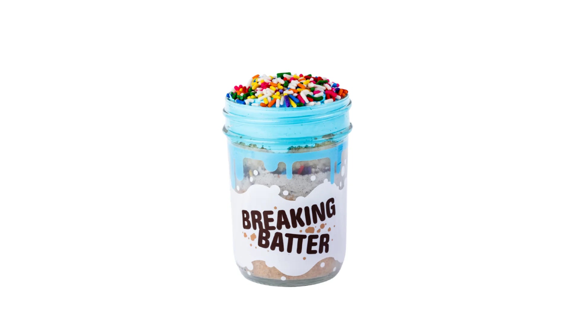 A Breaking Batter Cake Jar with Vanilla Cake, Cookies & Cream Frosting, Blue Vanilla Frosting and Rainbow Sprinkles. 