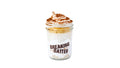 A Breaking Batter Cake Jar with Vanilla Tres Leches Cake, Tres Leches Frosting, Dulce De Leches Sauce and a Dusting of Cinnamon.
