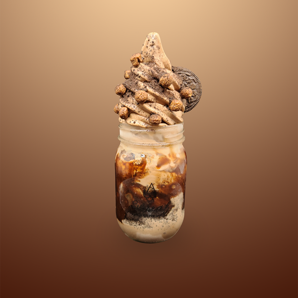 Surreal Creamery Chocolate Blackout Ice Cream Mason jar. Chocolate Ice Cream, Chocolate Crunch, Chocolate Syrup, Cocoa Puffs, and Oreos.