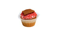 A Vanilla Cupcake Filled with Strawberry Filling, Topped with Cream Cheese Frosting, Strawberry Crunch and Graham Cracker. 