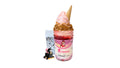 A tokidoki inspired Breaking Batter Ice Cream Cheesecake Jar with Cheesecake, Vanilla Cake, Cream Cheese Frosting, Strawberry Toppings, Graham Crackers, Strawberry Ice Cream and a Mini Cone. Served in a limited-edition mason jar and paired with one 1" tokidoki mystery collectible.