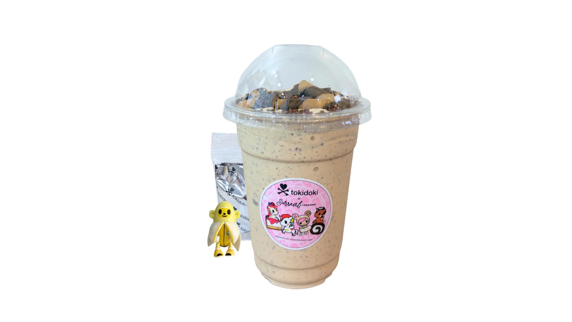A tokidoki inspired Milkshake with Earl Grey Vanilla & Vietnamese Iced Coffee Ice Cream, Chocolate Sprinkles and Chocolate Straws. Comes with one 1" tokidoki mystery collectible.