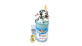 A tokidoki inspired Breaking Batter Ice Cream Cake Jar with Vanilla Cake, Cookies and Cream & Blue Vanilla Frosting, Chocolate Chips, Whipped Cream and Monster Cookie Ice Cream. Served in a limited-edition mason jar and paired with one 1" tokidoki mystery collectible.