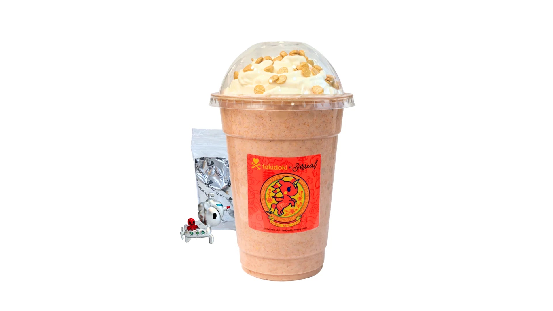 A tokidoki inspired Milkshake with Earl Grey Vanilla Ice Cream, Red Velvet Cake, Whipped Cream and Golden Sprinkles. Comes with one 1" tokidoki mystery collectible.