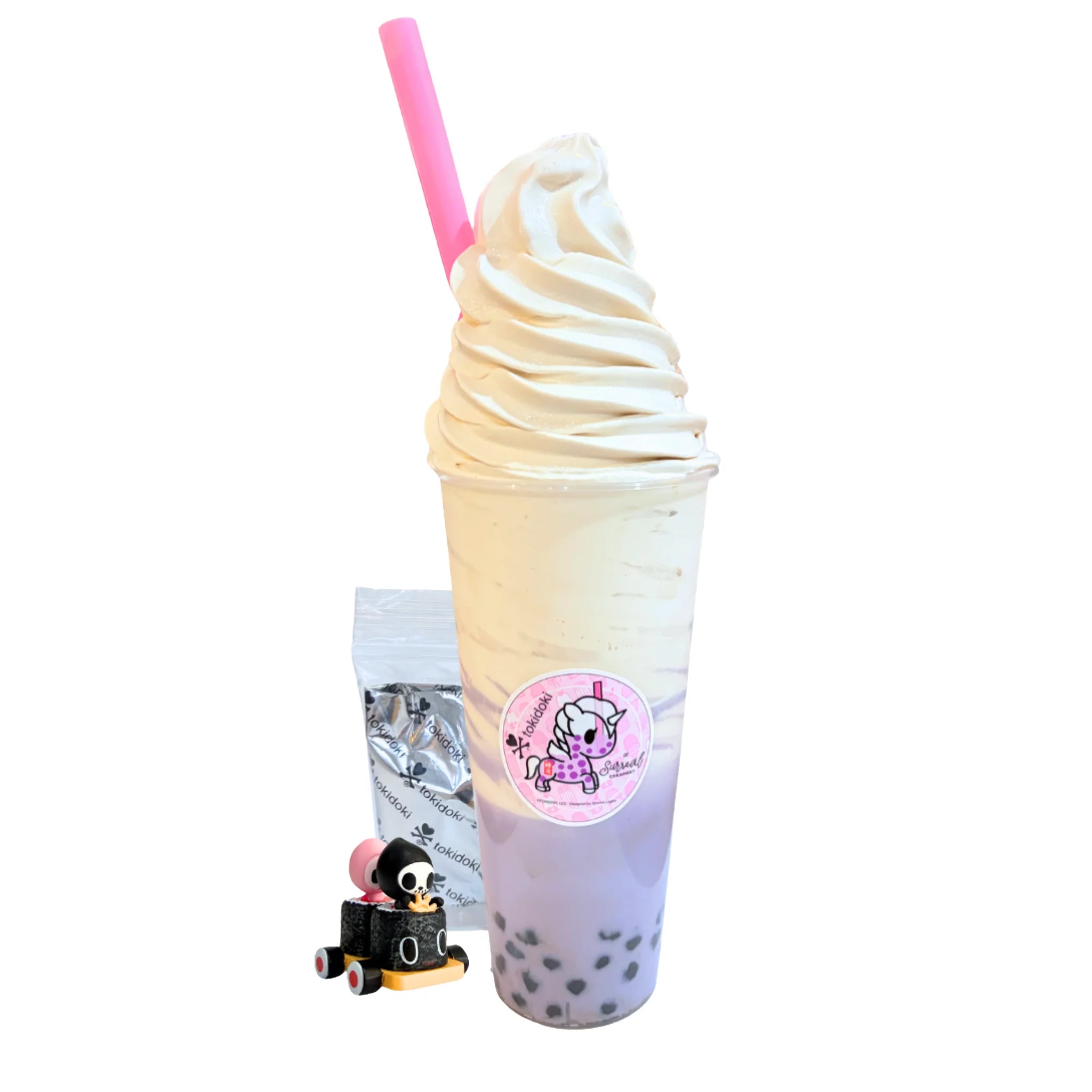 Taro Bubble Tea Topped with Earl Grey Soft Serve Ice Cream and a Pink Straw. Comes with a 1” tokidoki Mystery Collectible. 